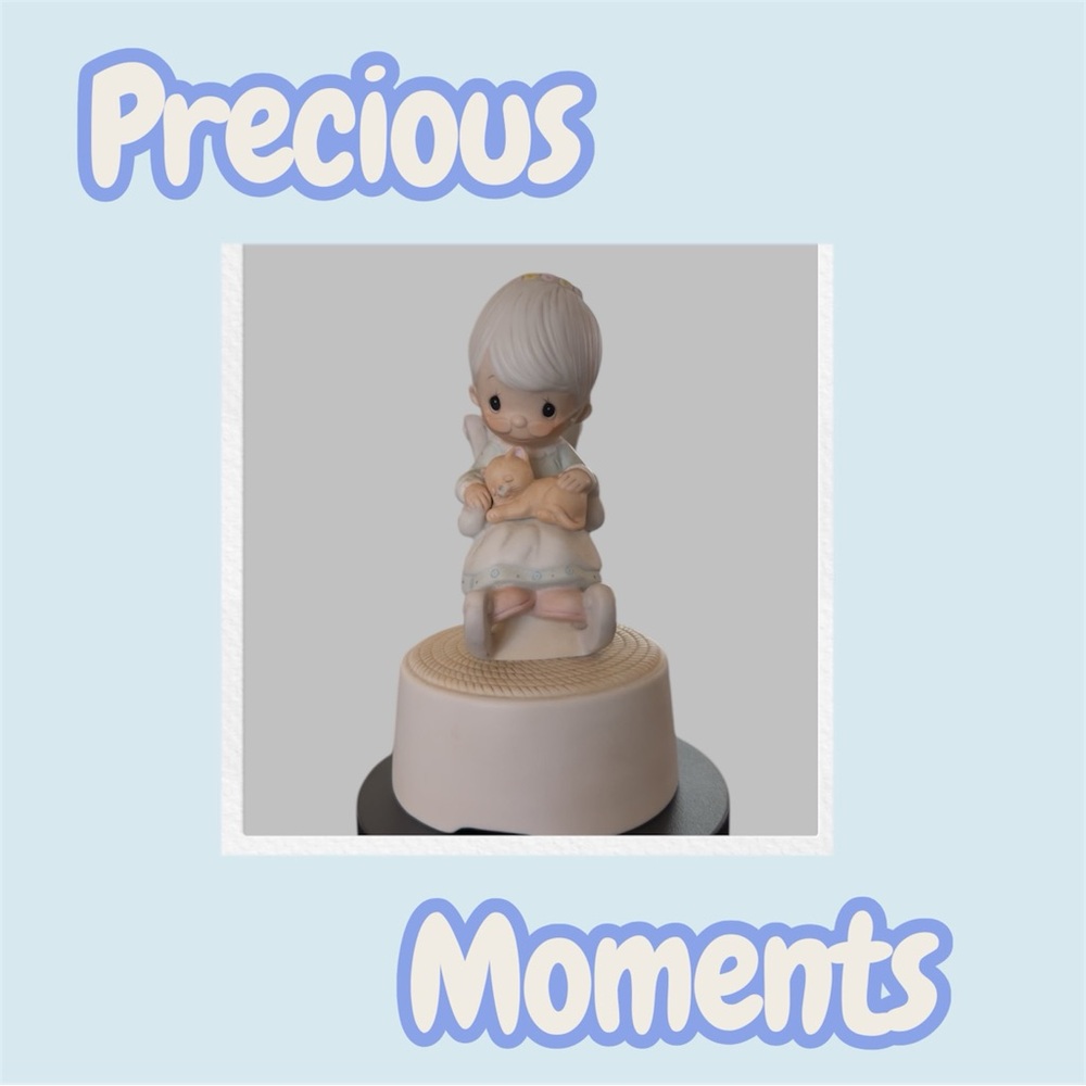 Enesco Porcelain Musical Figurine in Soft Cream and Tan